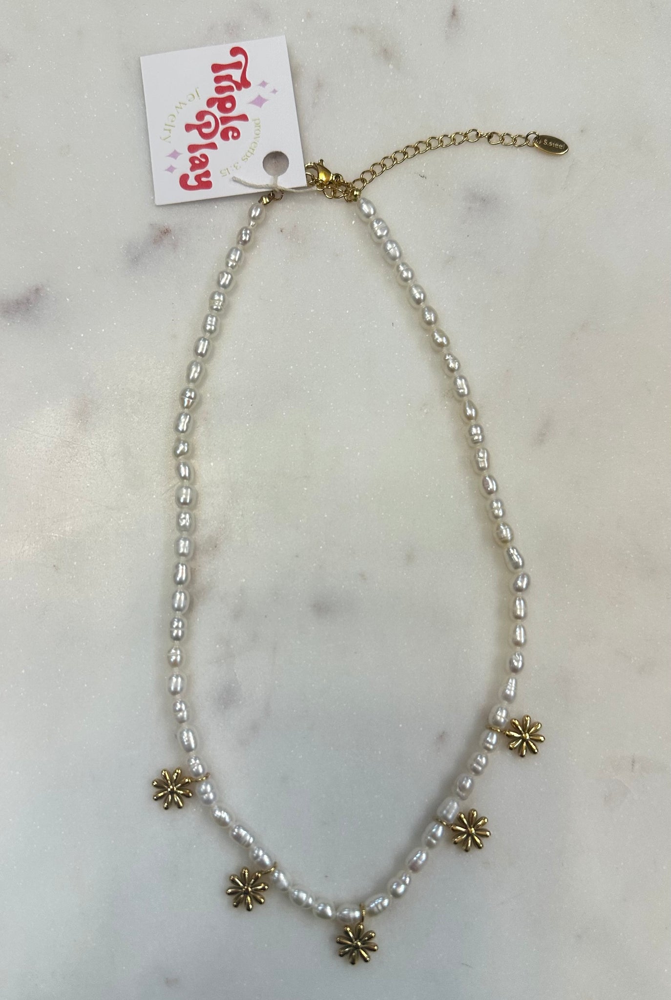 triple play pearl necklace with daisy charms