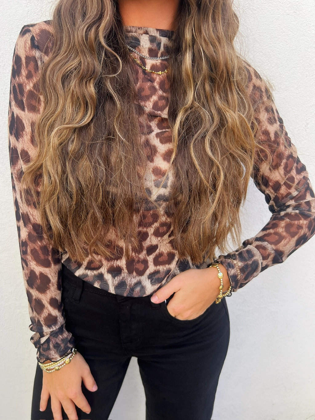 leopard layering top