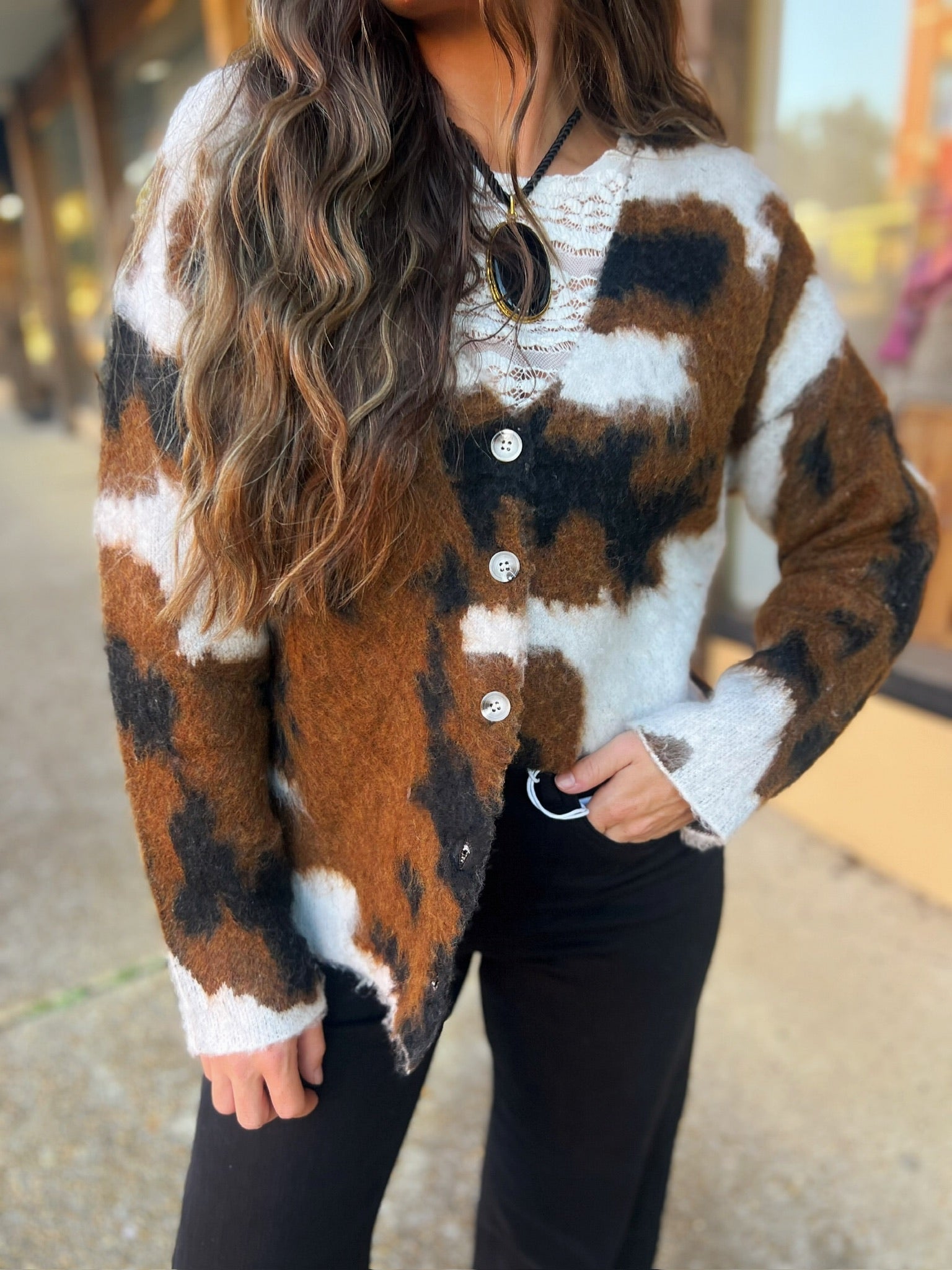 tucker cow print sweater